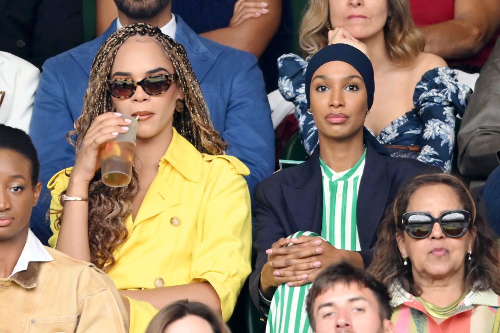 LONDON, ENGLAND - JULY 08: Yasmin Finney and Ikram Abdi Omar attend day eight of the Wimbledon Tennis Championships at the All England Lawn Tennis and Croquet Club on July 08, 2024 in London, England. (Photo by Karwai Tang/WireImage)