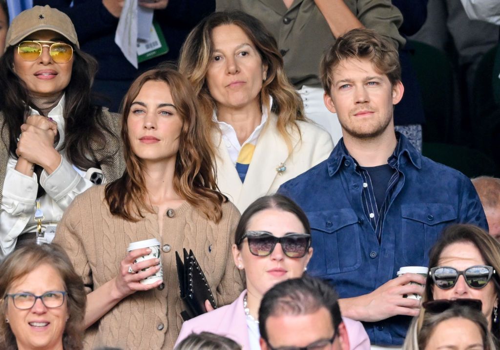 LONDON, ENGLAND - JULY 10: (L-R) Kalyani Saha Chawla, Alexa Chung and Joe Alwyn attend day ten of the Wimbledon Tennis Championships at the All England Lawn Tennis and Croquet Club on July 10, 2024 in London, England. (Photo by Karwai Tang/WireImage)