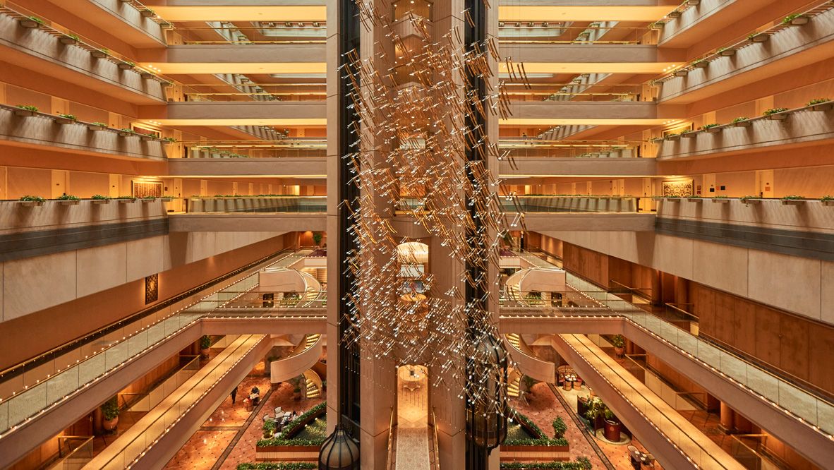 A view of the atrium in Conrad Singapore Orchard with a striking structural centrepiece