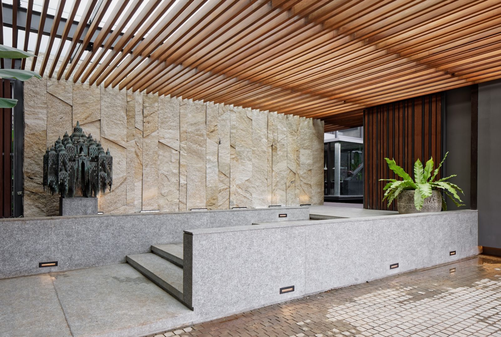 Borobudur, a bronze sculpture by artist Nyoman Nuarta in Genius Loci's Jakarta office