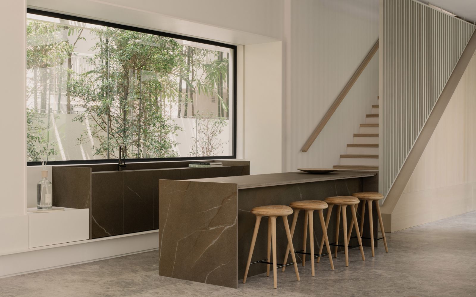 A view of the minimalist kitchen with a picture window