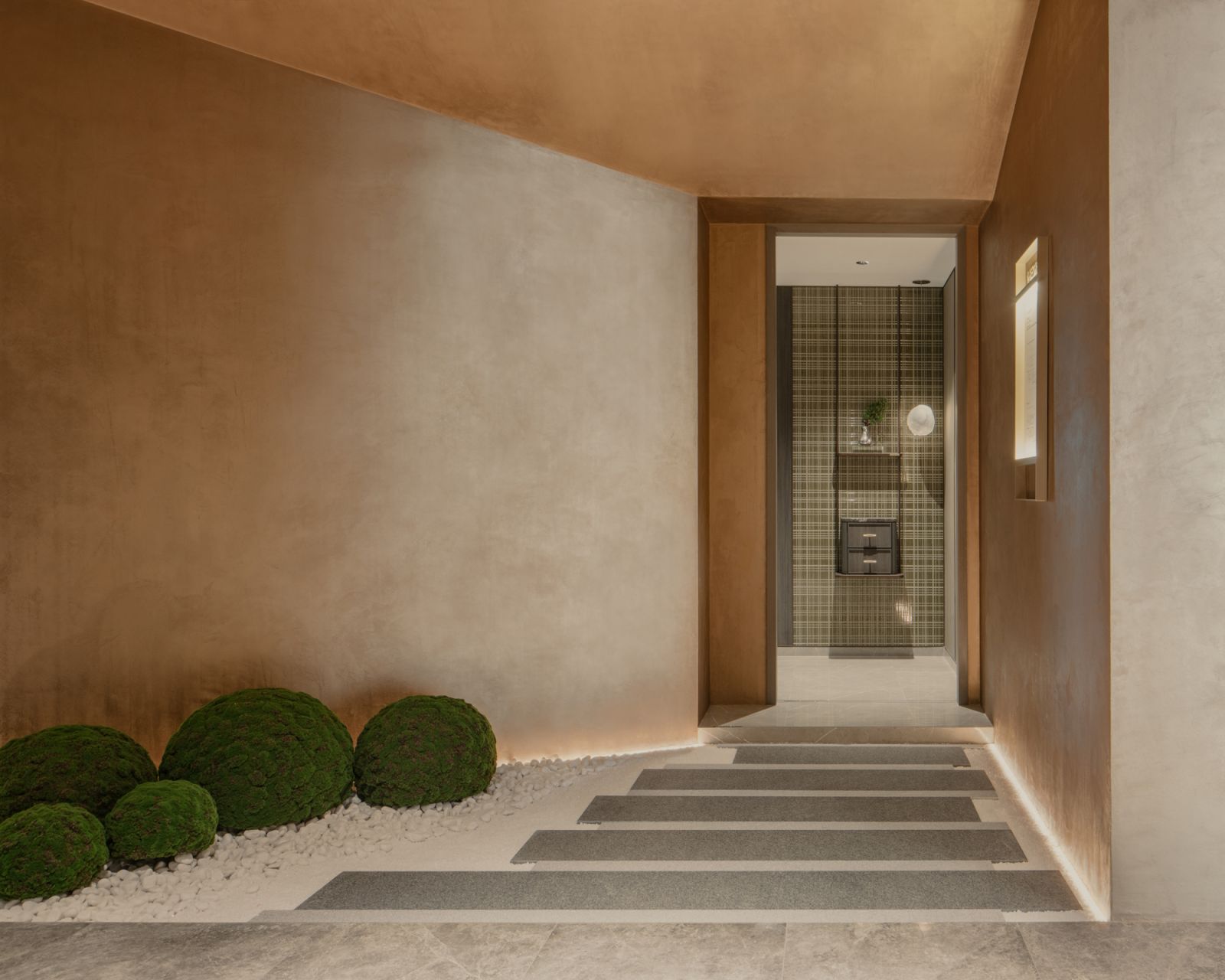 A tranquil pebbled path leads to the show unit