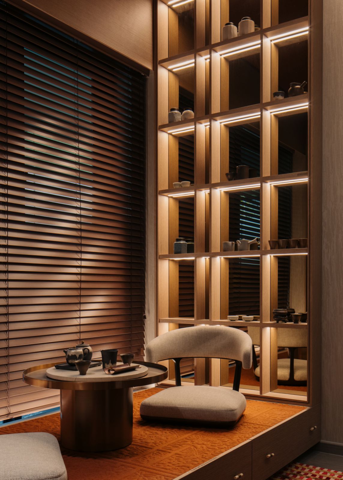 Backlit traditional Japanese shelves cast enchanting shadows on the blinds in the tea room