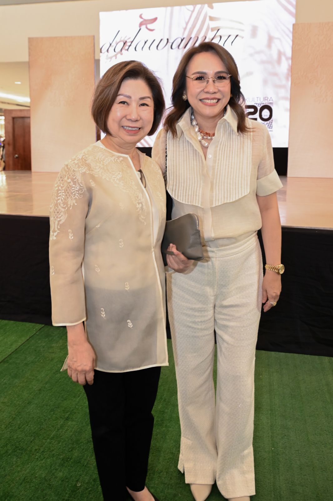 Tessie Sy-Coson smiles next to Ivy Yap, President of Kultura (Photo: Courtesy of SM)