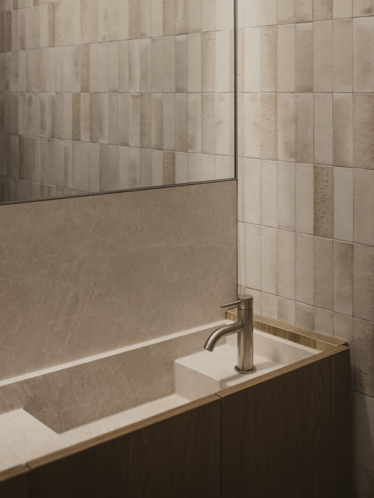 The sink area is encased in timber, consistent with the rest of the house