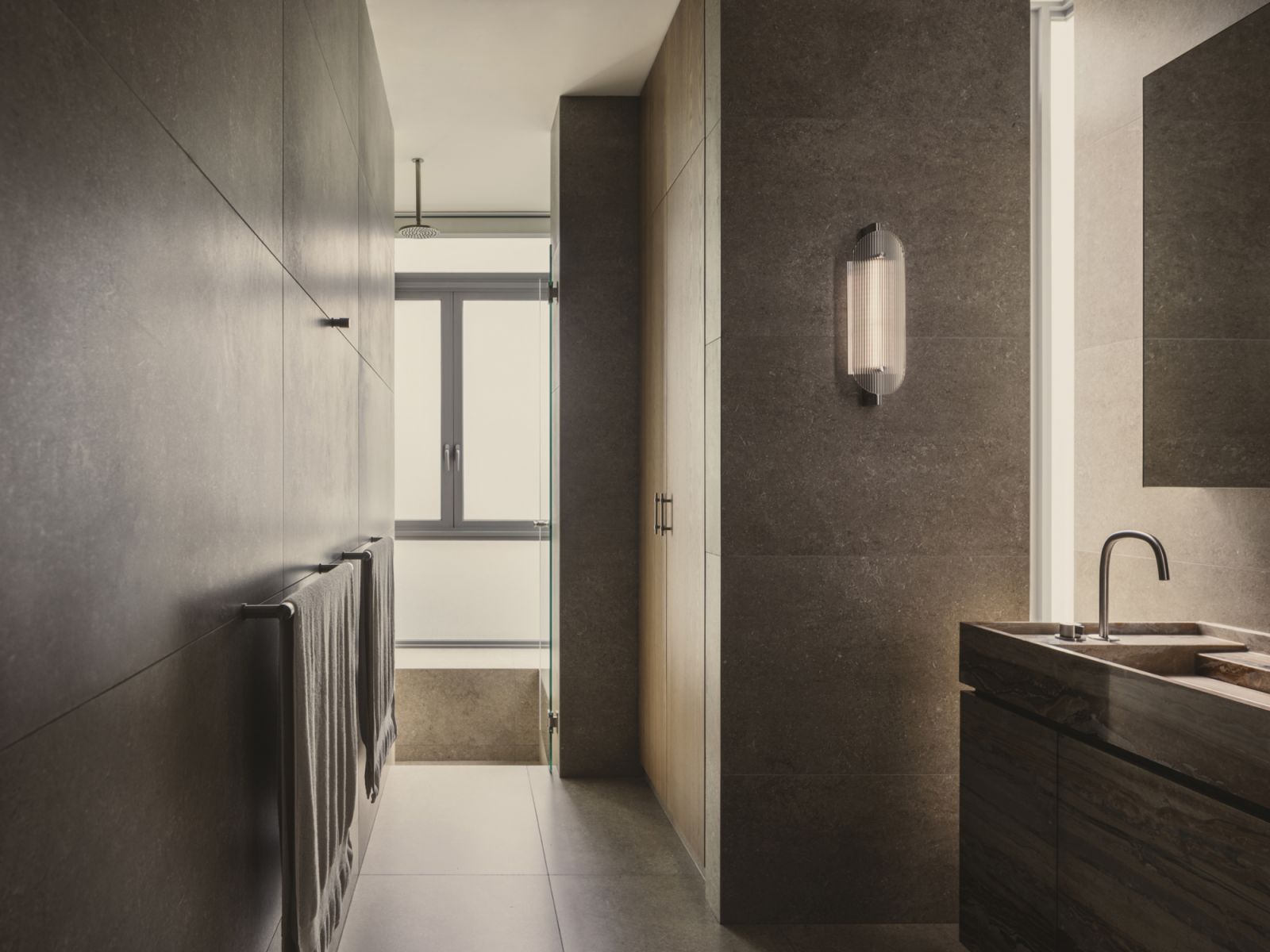 A custom Rosso Orobico marble washbasin counter, replacing a bathtub