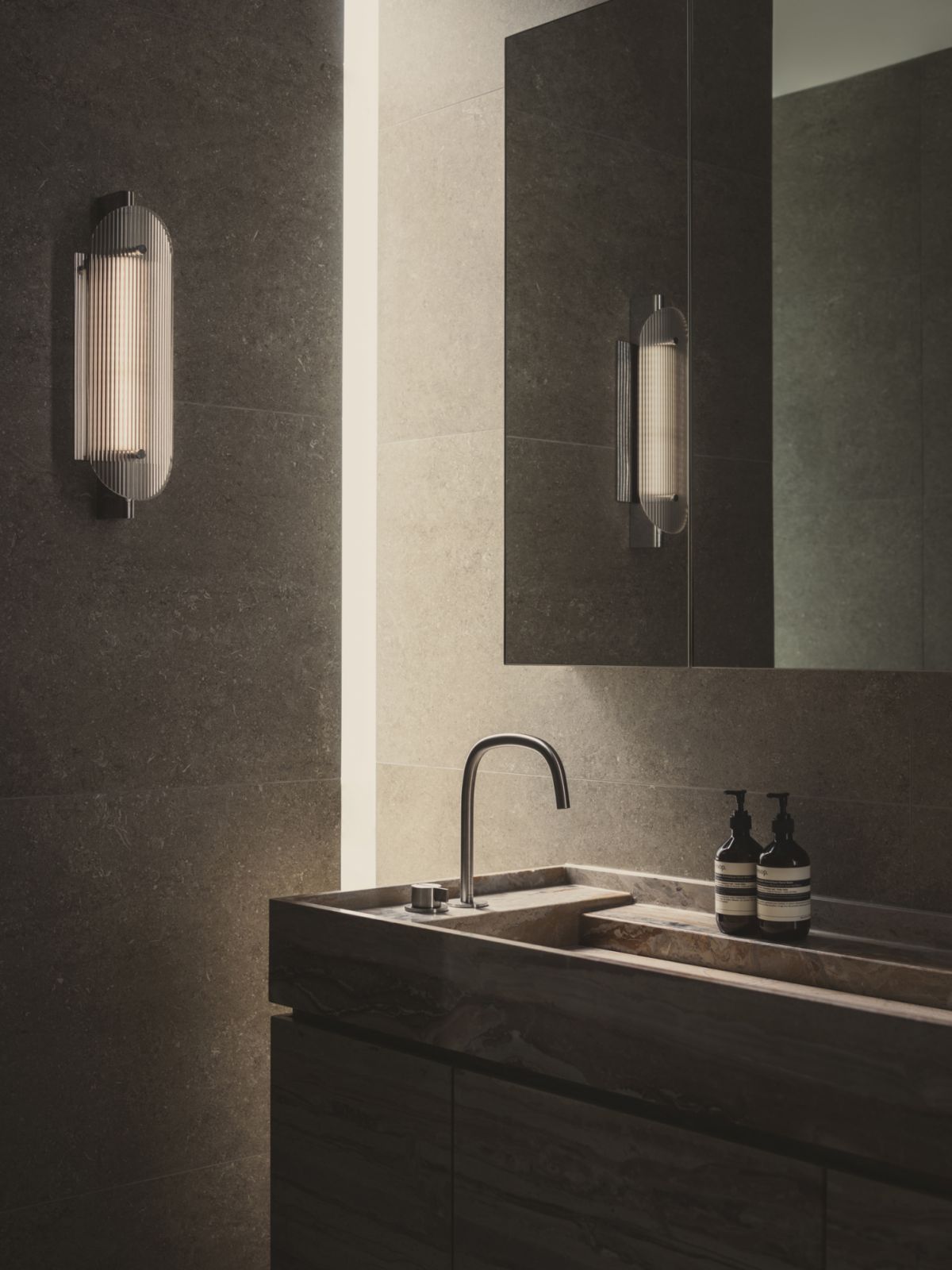Close-up of the Rosso Orobico marble washbasin counter