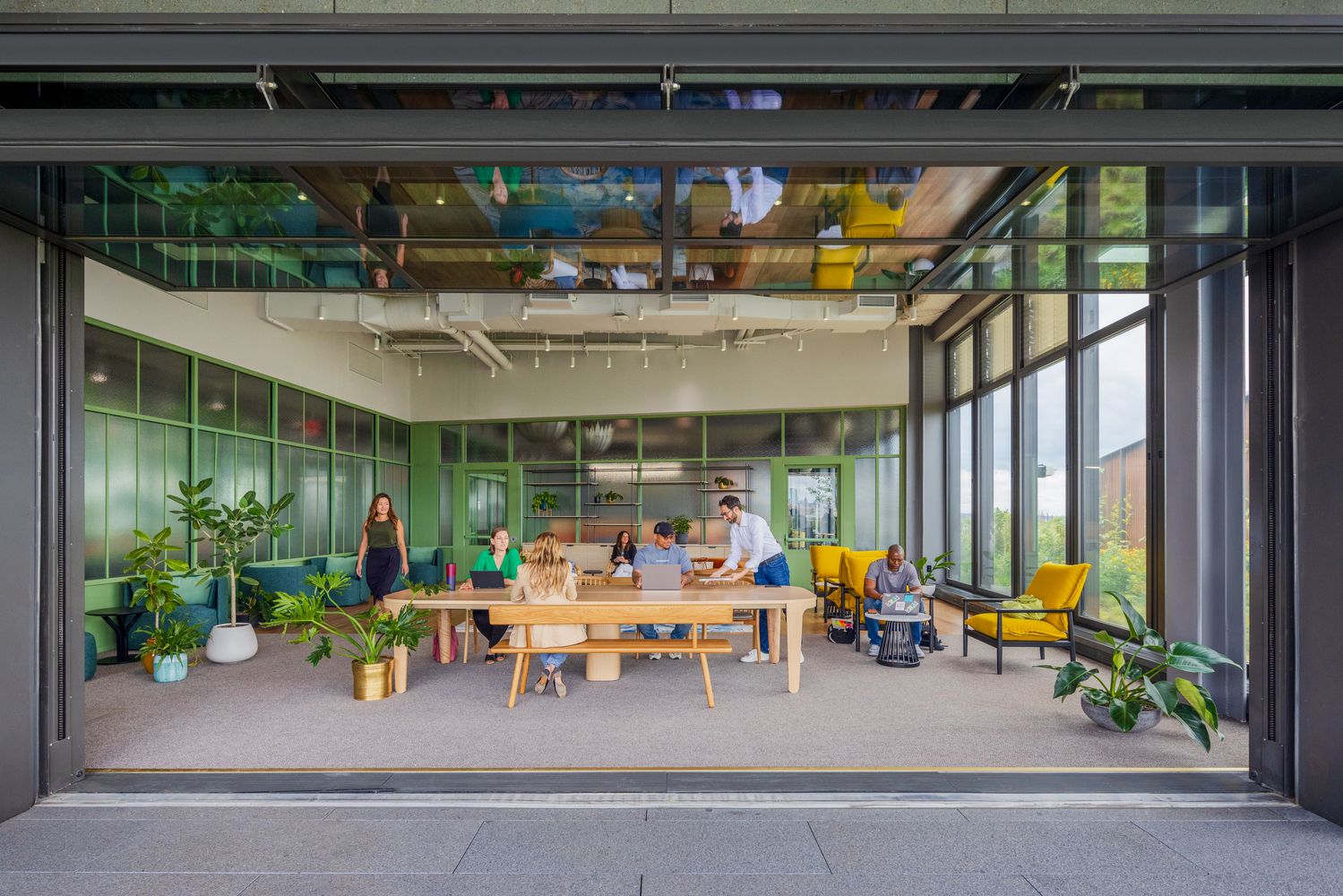A “shared neighbourhood” seating model that fosters social connections among its 14,000 plus employees (Photo: Mark Wickens, @cookfox / Instagram)