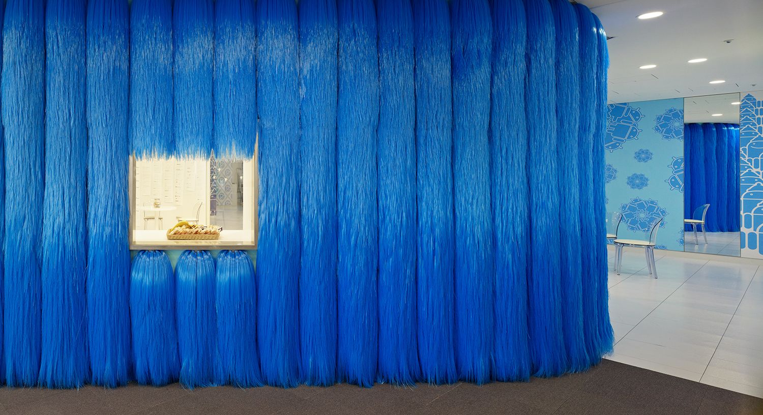 The Big Blue kitchen with car wash brushes on the wall (Photo: Daici Ano / Koichi Torimura, @klein_dytham_architecture / Instagram)