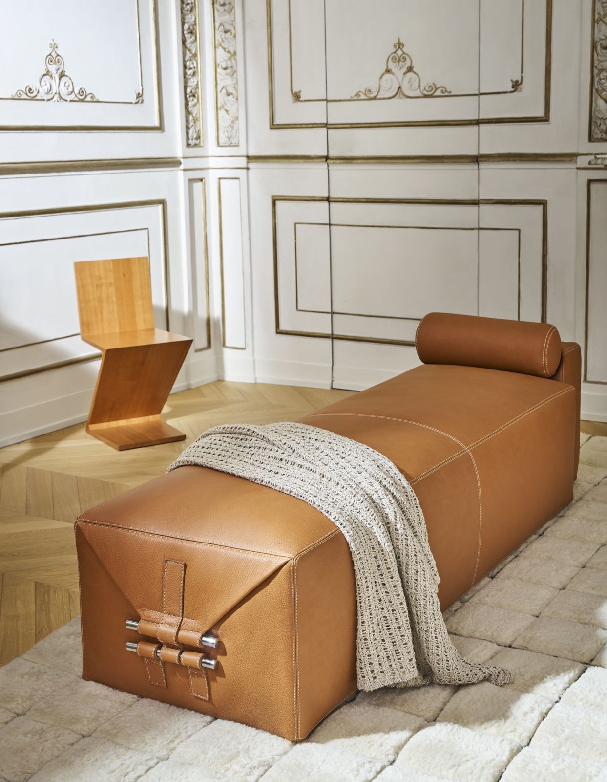The rectangular ottoman can be used as a daybed with or without a backrest