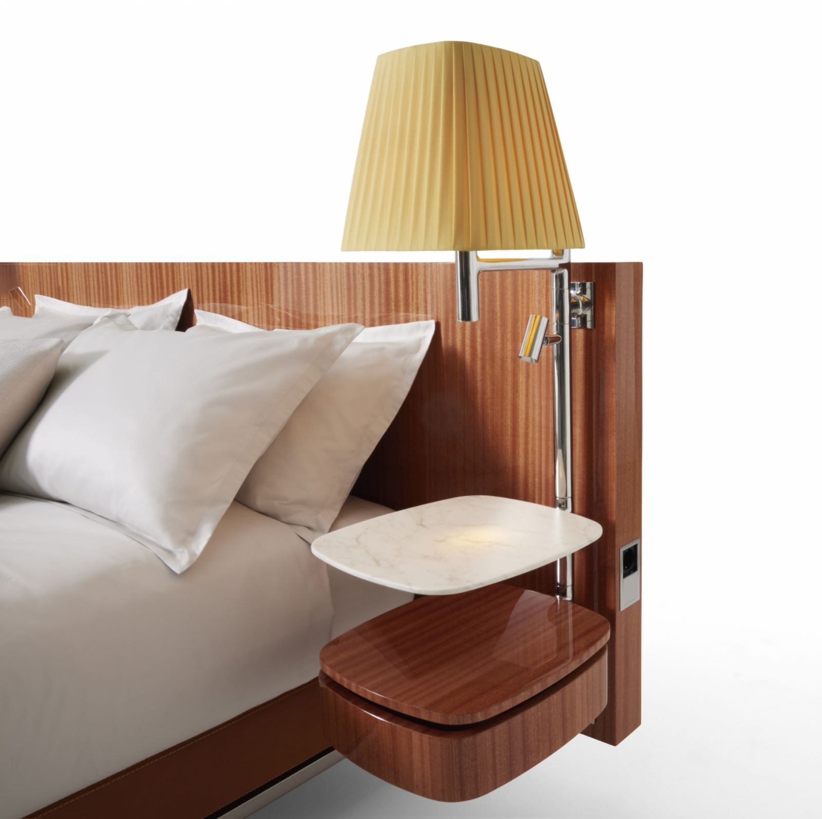 The fabric abat-jour atop the floating marble-topped side table