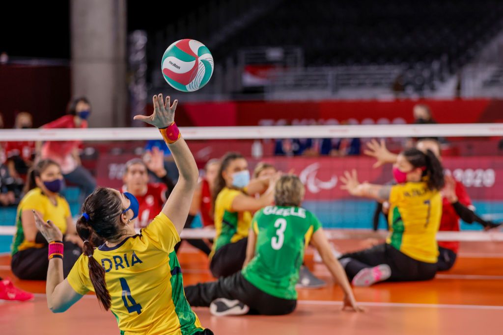 In sitting volleyball, players cannot leave the sitting position and may slide around to get the ball (Photo: Getty Images)