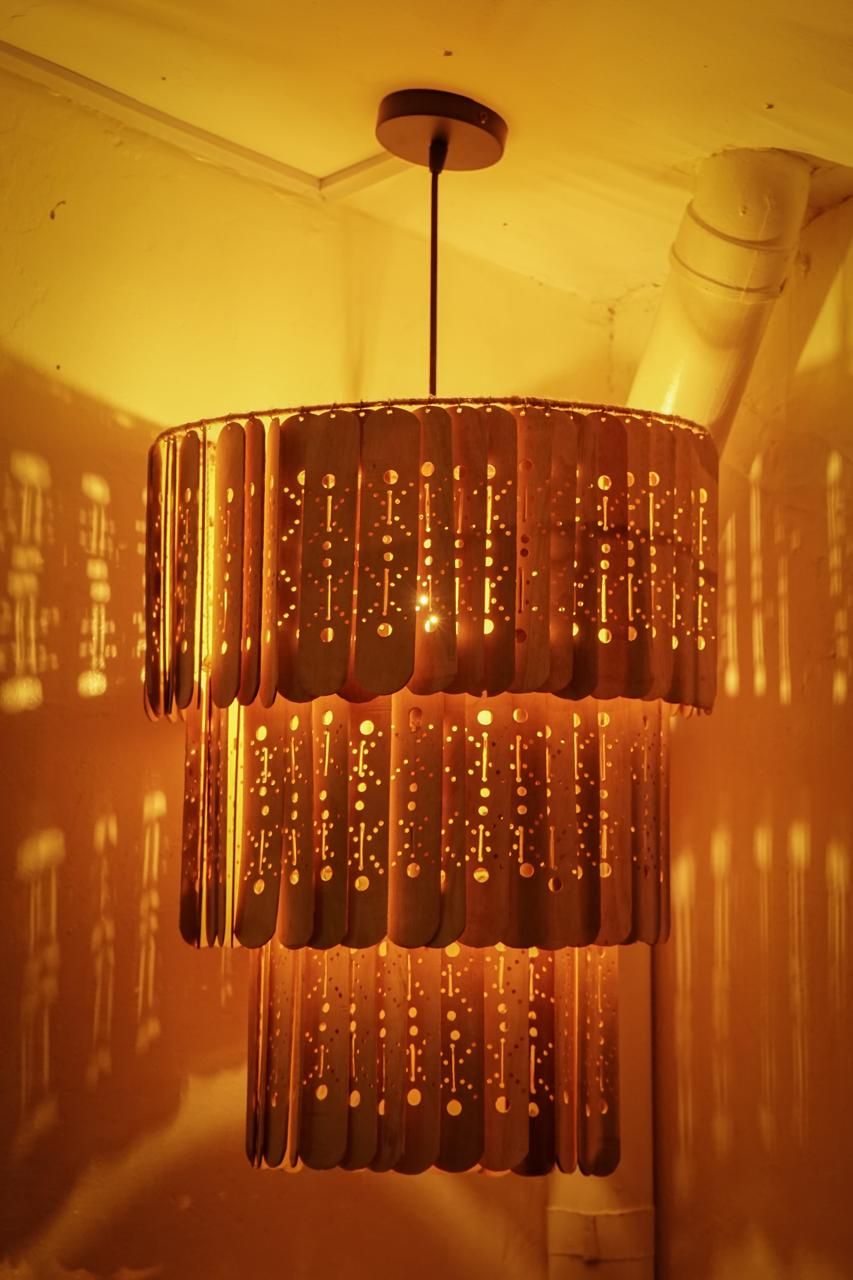 The Dancing Man Chandelier in Mahogany Wood by Artifeks Design Studio