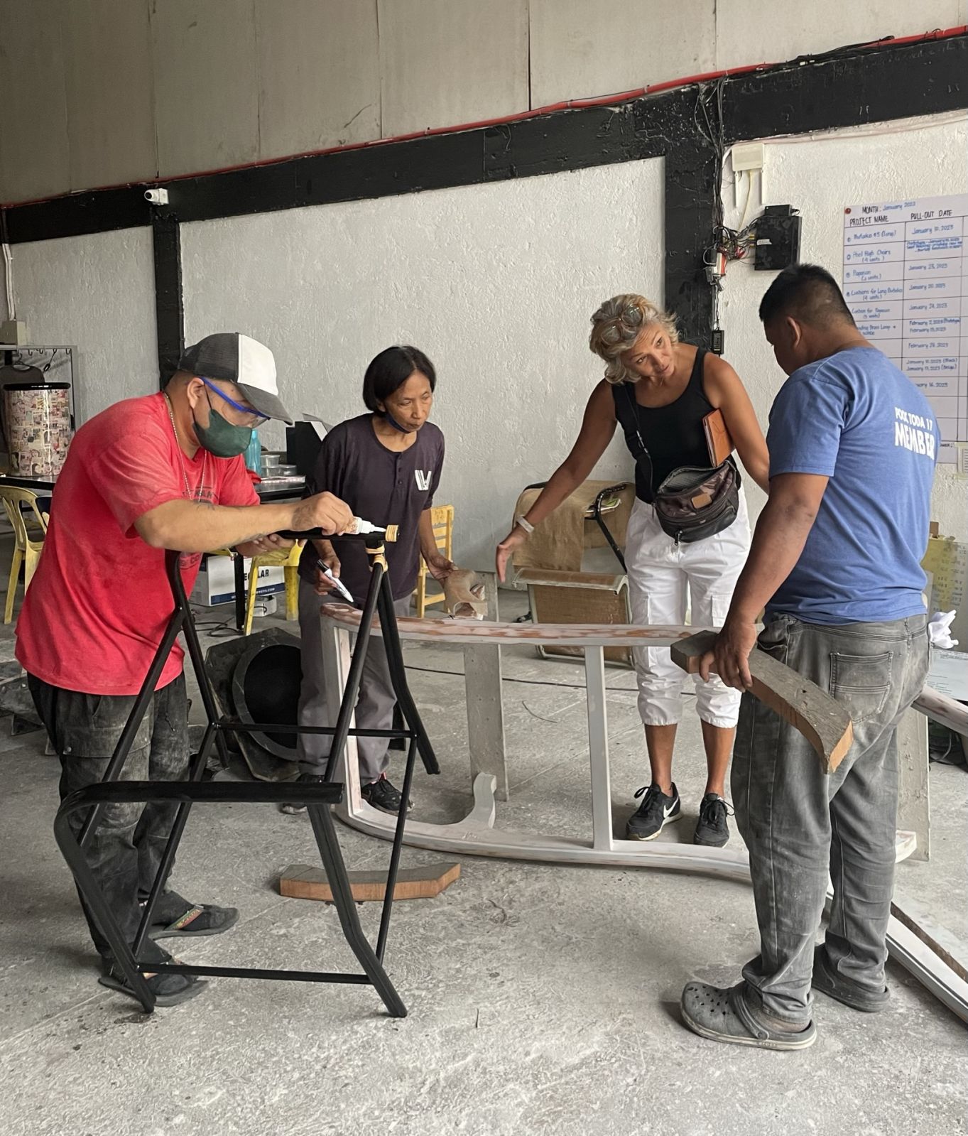 Clair Barberis working with artisans in the studio