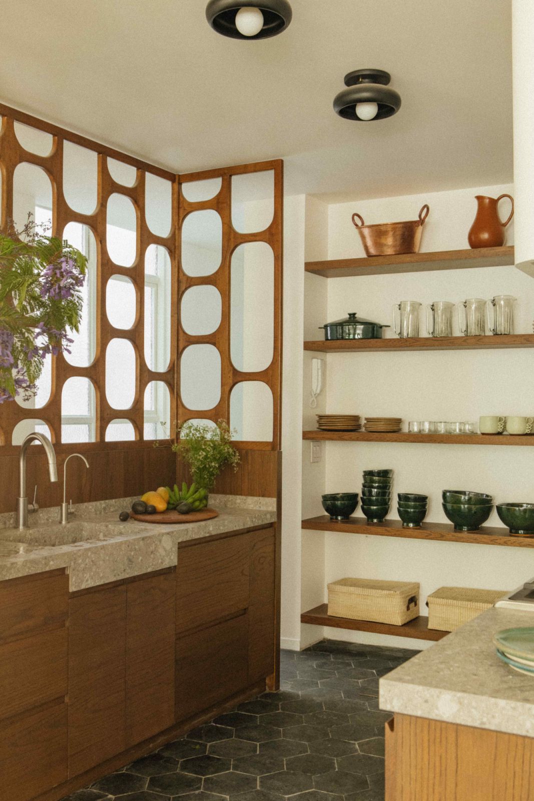 Wood and stone are key drivers in the snug kitchen corner (Photo: Maureen M Evans)