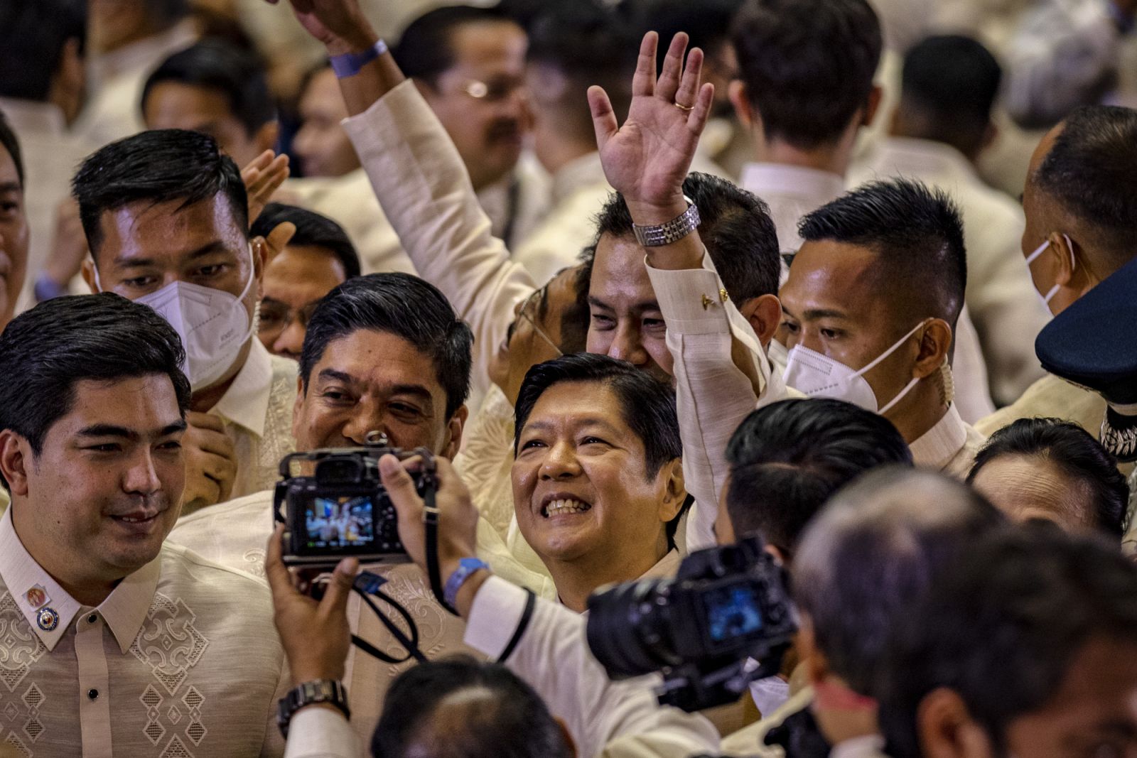 Philippine President Ferdinand Marcos Jr. waves to lawmakers after delivering his first State of the Nation Address at the House of Representatives in 2022 (Photo by Ezra Acayan/Getty Images)