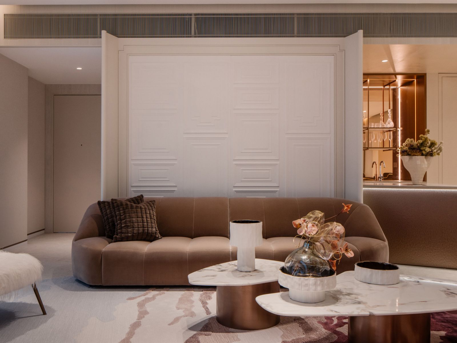 A Cloud Infinity sofa from Radice & Gallotti is situated between the living and dining areas