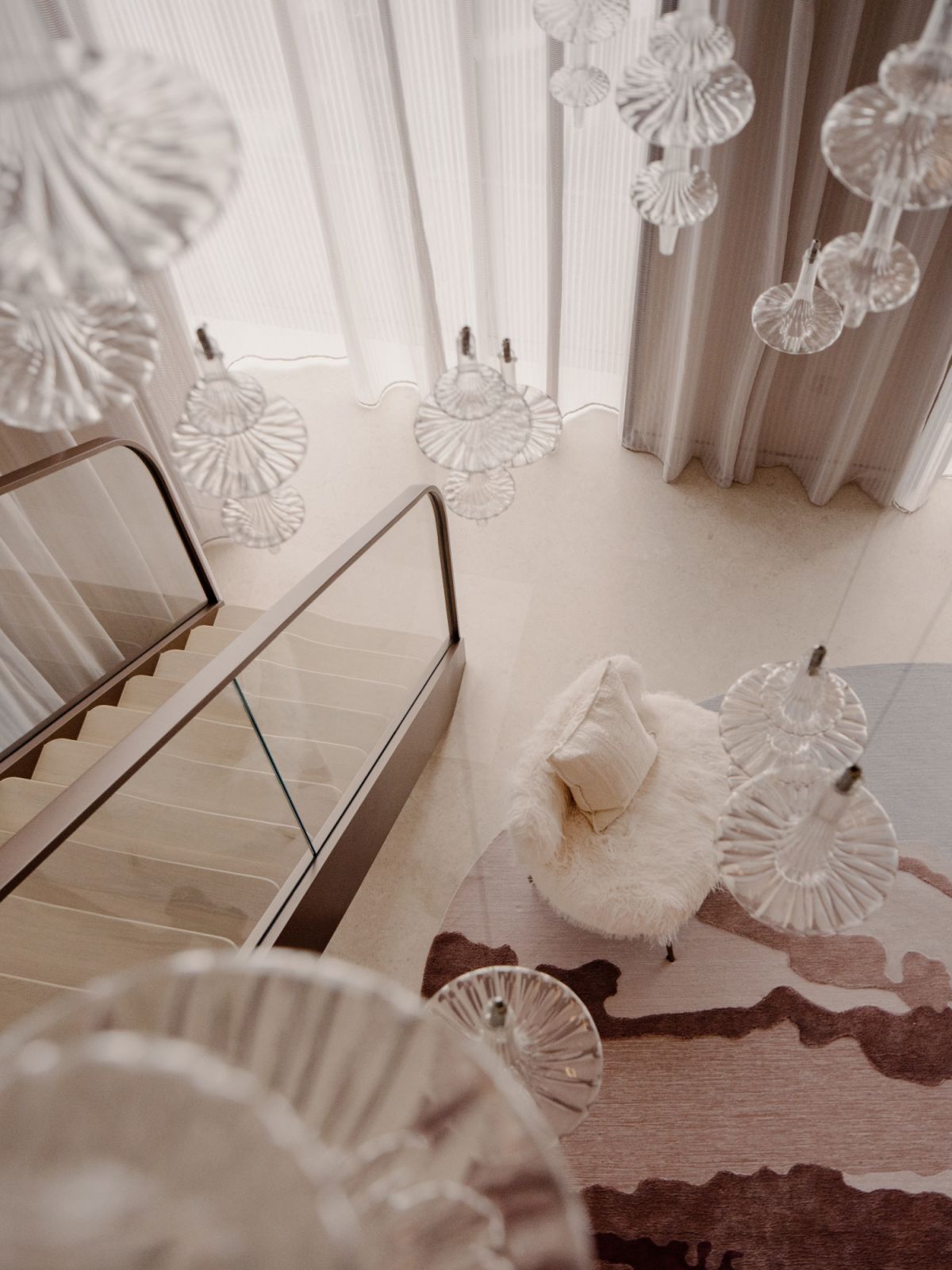 The muted pink and plum palette of the living area is inspired by Tan’s trip to Japan and spotting late-winter plum blossoms