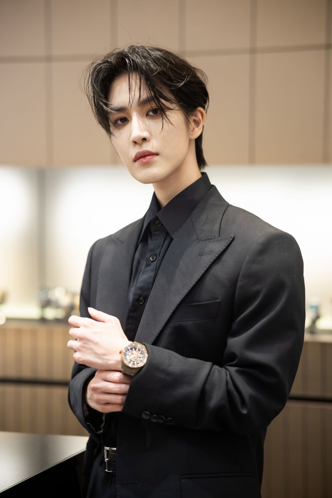 Hakken sporting a Rado timepiece