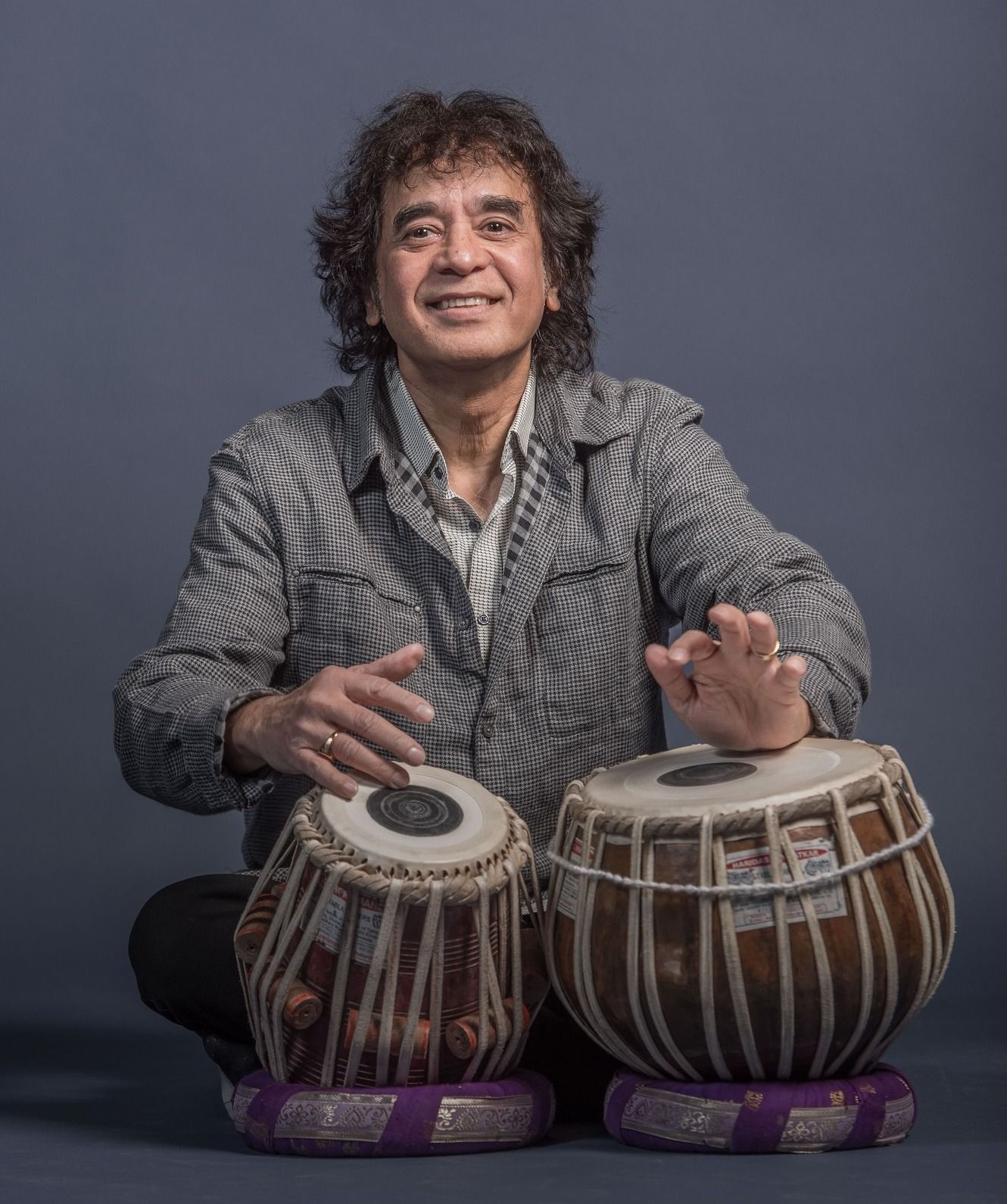 Hussain approaches music like a language, just as his father did, speaking the rhythm with expression (Photo: Facebook.com / @Mooretheatre)