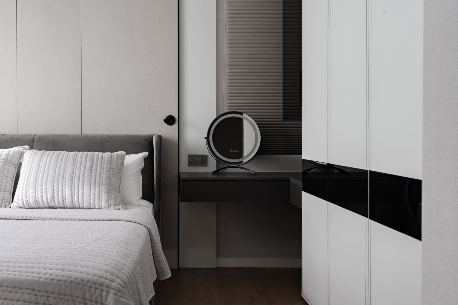 A petite vanity corner maximises the space in the bedroom