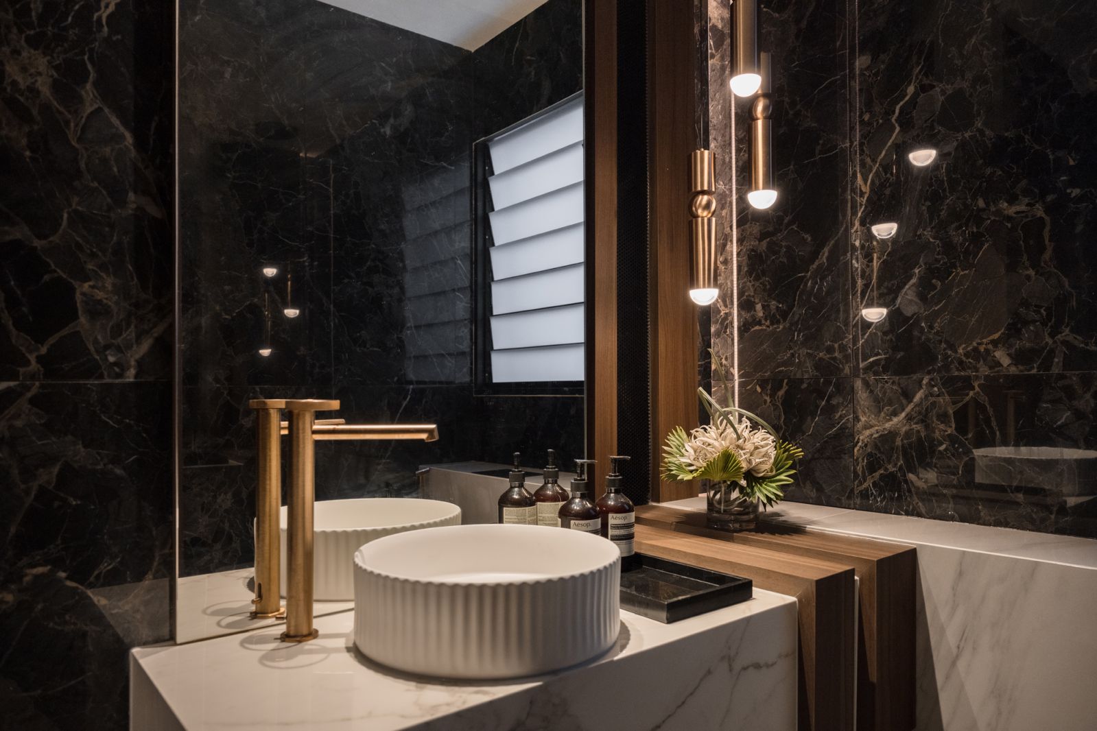 A dark and sumptuous bathroom design