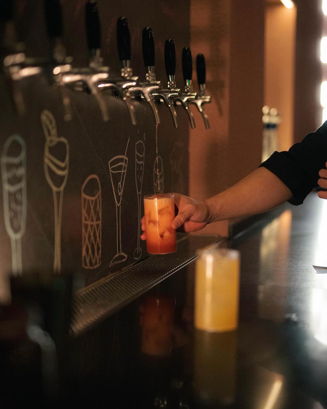 Cocktails on tap at Here & Now (Photo: Instagram / @hereandnow.my)