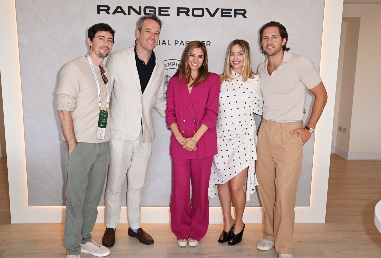 LONDON, ENGLAND: (L to R) Papa Salt co-founders Josey McNamara, Charlie Maas, Regan Riskas, Margot Robbie and Tom Ackerley attend the Men's Semi-Finals during The Championships at Wimbledon as guests of Range Rover on July 12, 2024 in London, England. Photo by Dave Benett