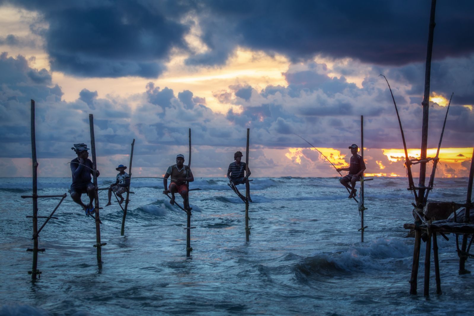 A photo of a group of stilt fishermen in Sri Lanka, took by a tour participant (Photo: Ho Sai Lai)