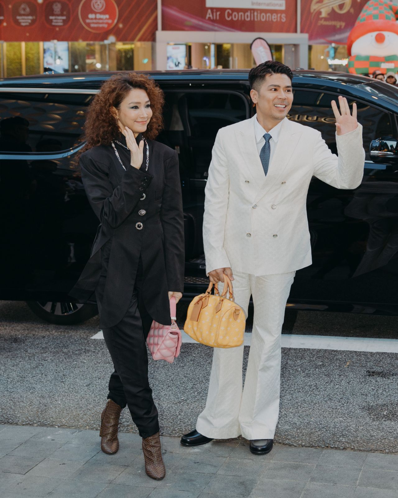 Scha Alyahya and Awal Ashaari at the store opening of Louis Vuitton Pavilion KL