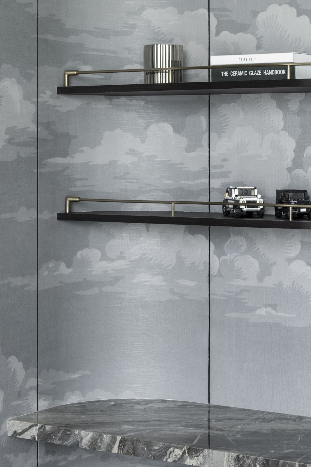 Artisanal wallpaper provides an elegant backdrop