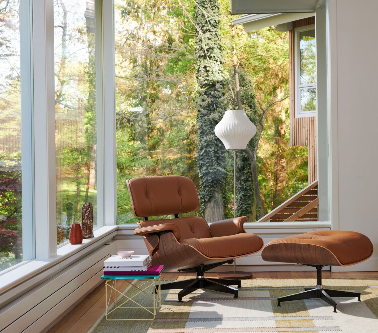 The Eames Lounge Chair and Ottoman in bamboo-based leather Russet