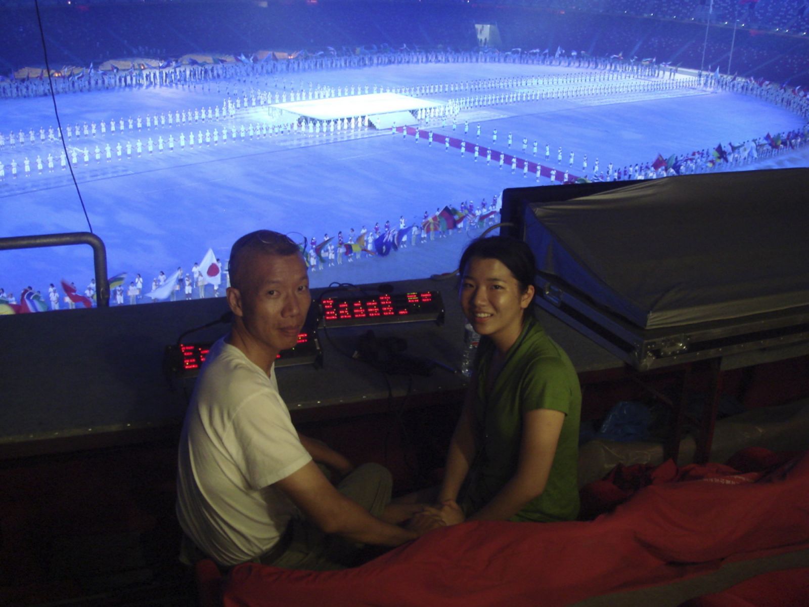 2. Cai Guo-Qiang and daughter Wen-You Cai at the rehearsal for the Beijing Olympic Opening Ceremony, 2008. (Photo courtesy Cai Studio)