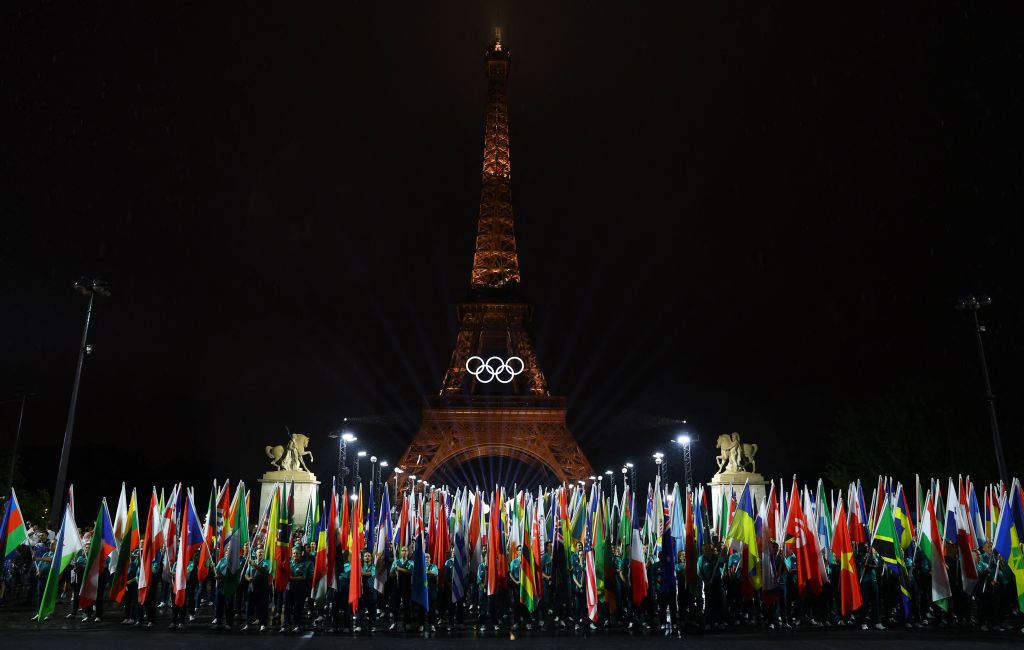PARIS, FRANCE - JULY 26: General view is seen of the flags of participating countries being carried during the Opening Ceremony of the Olympic Games Paris 2024 on July 26, 2024 in Paris, France. (Photo by Stephanie Lecocq - Pool/Getty Images)