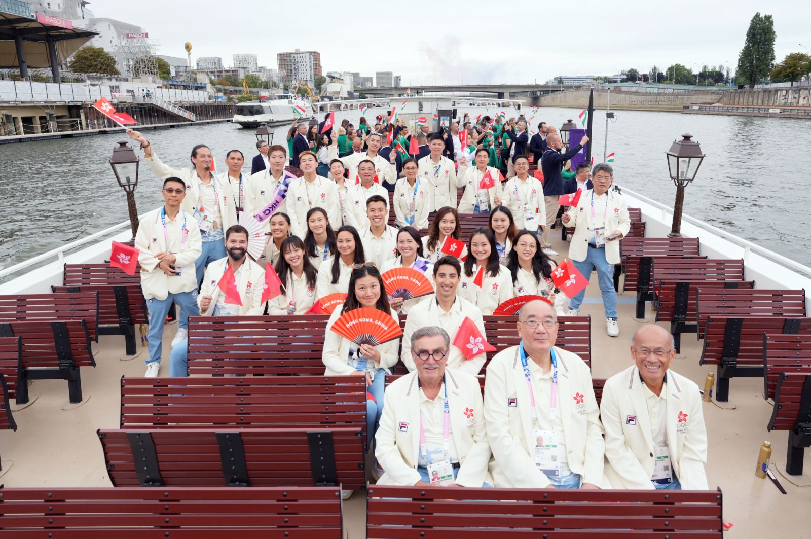PARIS, FRANCE - JULY 26: Members of the delegation of Hong Kong, China attend the opening ceremony of the Paris 2024 Olympic Games on July 26, 2024 in Paris, France. (Photo by Lui Siu Wai - Pool/Getty Images)