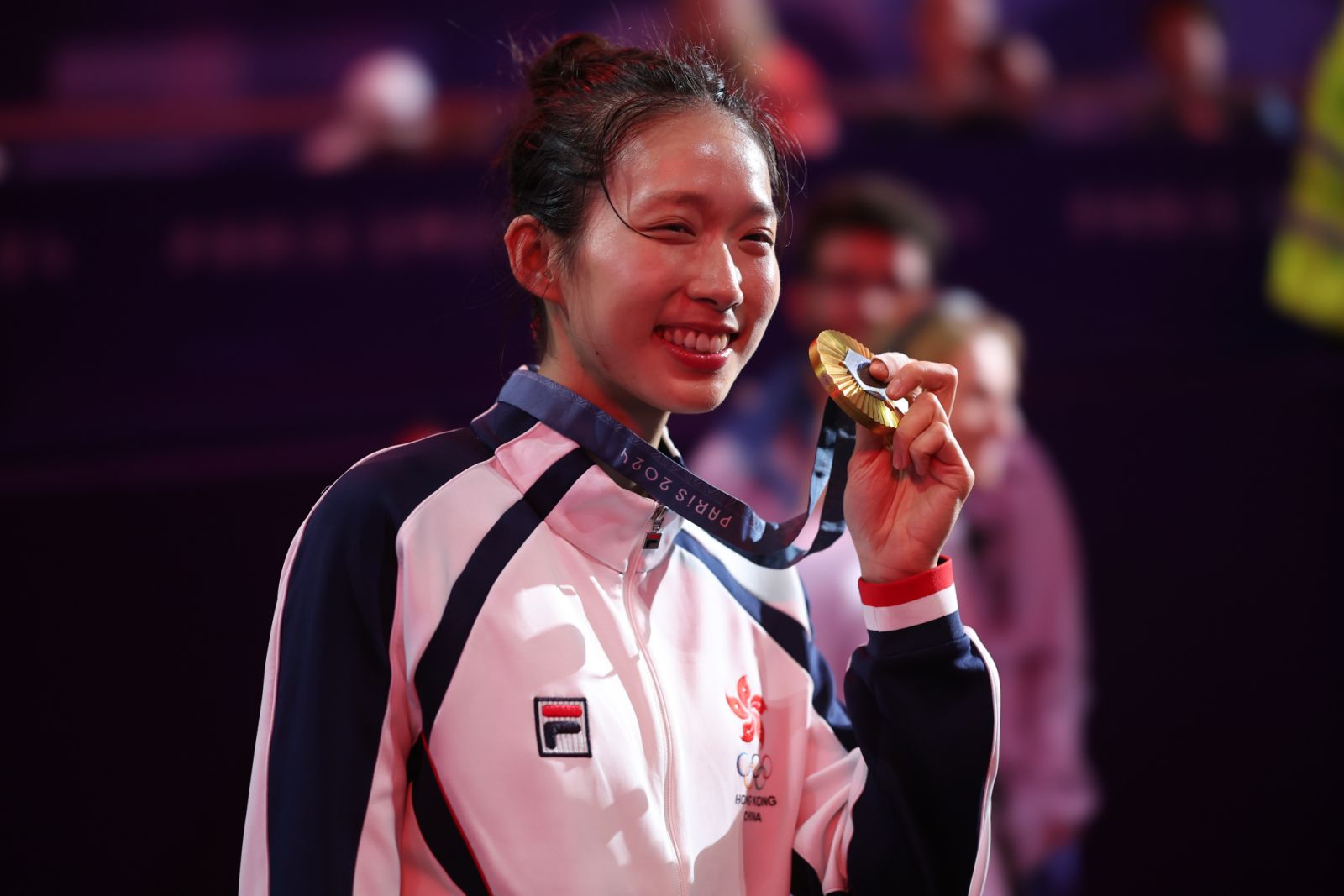 PARIS, FRANCE - JULY 27: Kong Man Wai Vivian of Team Chinese Hong Kong poses with gold medal during the Women's Epee Individual medal ceremony on day 1 of the Paris 2024 Olympic Games at the Grand Palais on July 27, 2024 in Paris, France. (Photo by Sheng Jiapeng/China News Service/VCG via Getty Images)