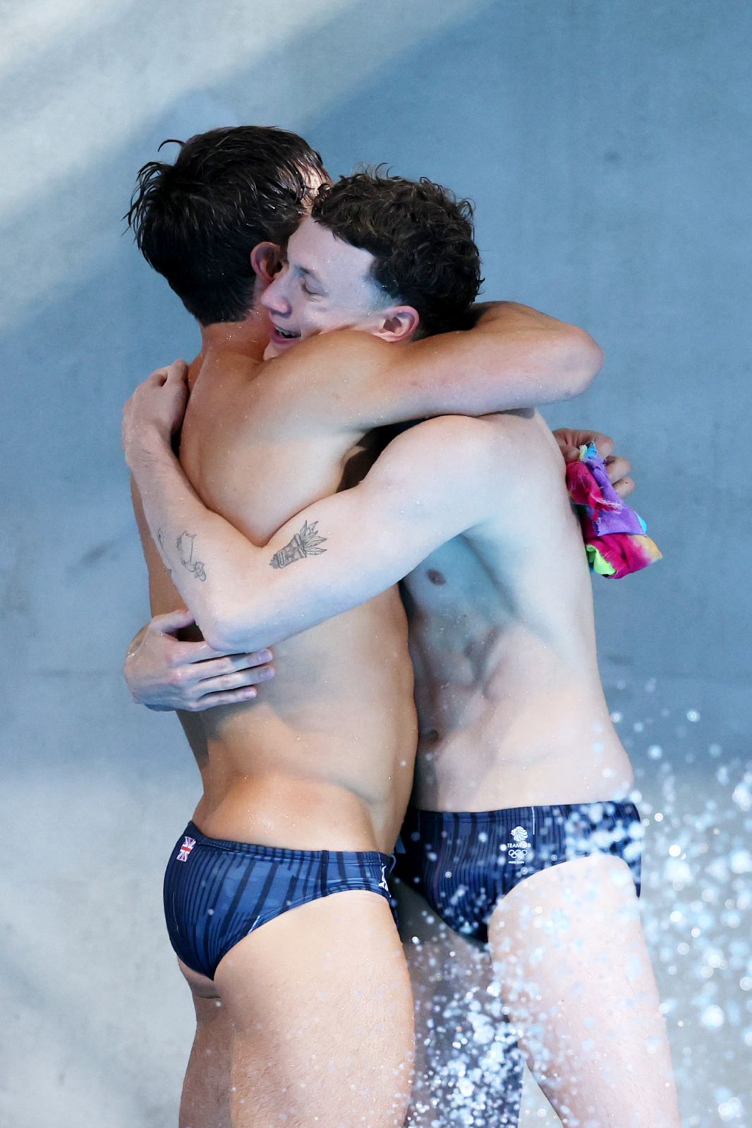 PARIS, FRANCE - JULY 29: Thomas Daley and Noah Williams of Team Great Britain celebrate after competing in the Men’s Synchronised 10m Platform Final on day three of the Olympic Games Paris 2024 at Aquatics Centre on July 29, 2024 in Paris, France. (Photo by Clive Rose/Getty Images)