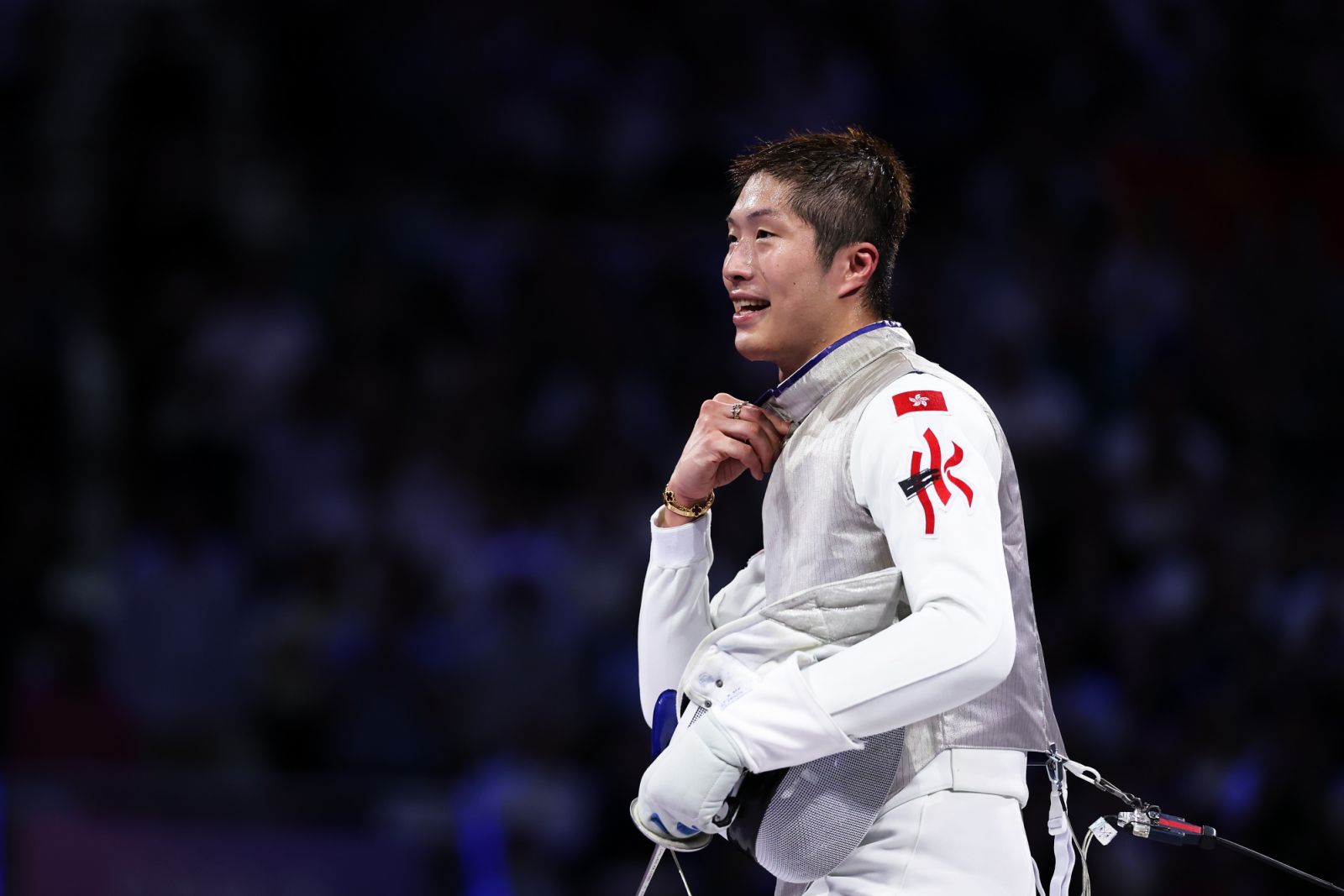 PARIS, FRANCE - JULY 29: Ka Long Cheung of team Hong Kong celebrates winning the Fencing Men's Foil Individual Gold Medal Bout on day three of the Olympic Games Paris 2024 at Grand Palais on July 29, 2024 in Paris, France. (Photo by Al Bello/Getty Images)