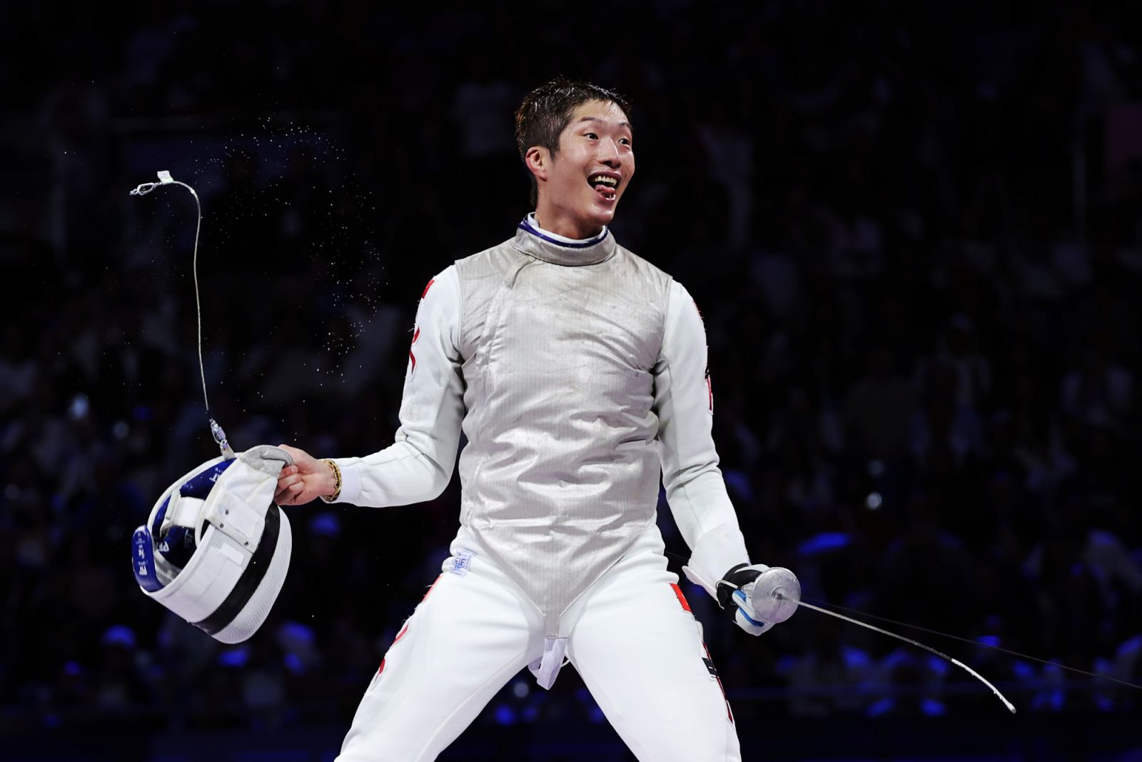 PARIS, FRANCE - JULY 29: Ka Long Cheung of team Hong Kong celebrates winning the Fencing Men's Foil Individual Gold Medal Bout on day three of the Olympic Games Paris 2024 at Grand Palais on July 29, 2024 in Paris, France. (Photo by Al Bello/Getty Images)
