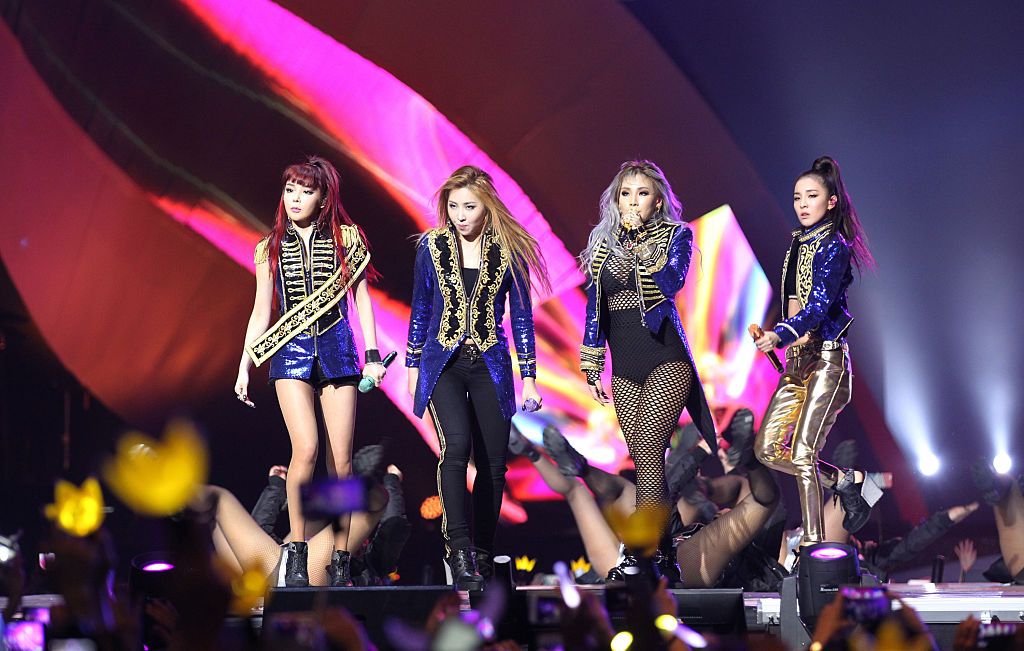 HONG KONG - DECEMBER 02:  (CHINA OUT) 2NE1 perform on the stage during the 2015 Mnet Asian Music Awards (MAMA) at AsiaWorld-Expo on December 2, 2015 in Hong Kong, China.  (Photo by Visual China Group via Getty Images/Visual China Group via Getty Images)