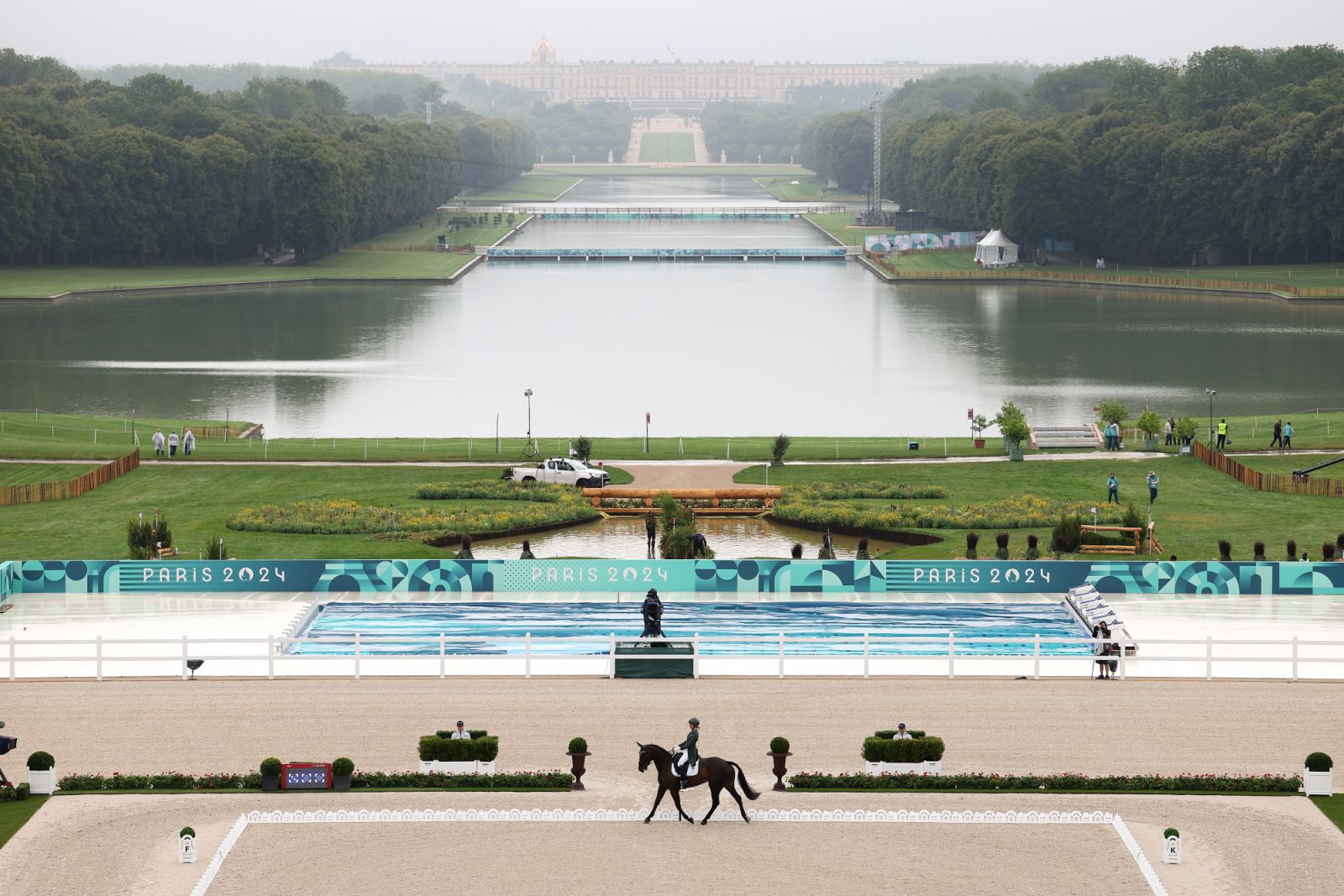 VERSAILLES, FRANCE - JULY 27: Sarah Ennis and Action Lady M of Team Ireland compete in the Eventing Individual Dressage leg on day one of the Olympic Games Paris 2024 at Chateau de Versailles on July 27, 2024 in Versailles, France. (Photo by Mike Hewitt/Getty Images)