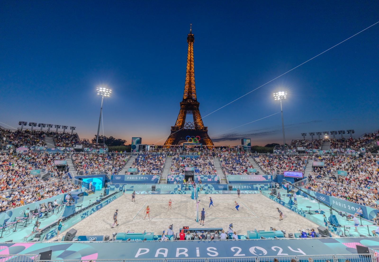 PARIS, FRANCE - JULY 28: People follow beach volleyball match between Team US and Team Czechia at the Eiffel Tower Stadium during Paris 2024 Olympic Games in Paris, France on July 28, 2024. (Photo by Aytac Unal/Anadolu via Getty Images)