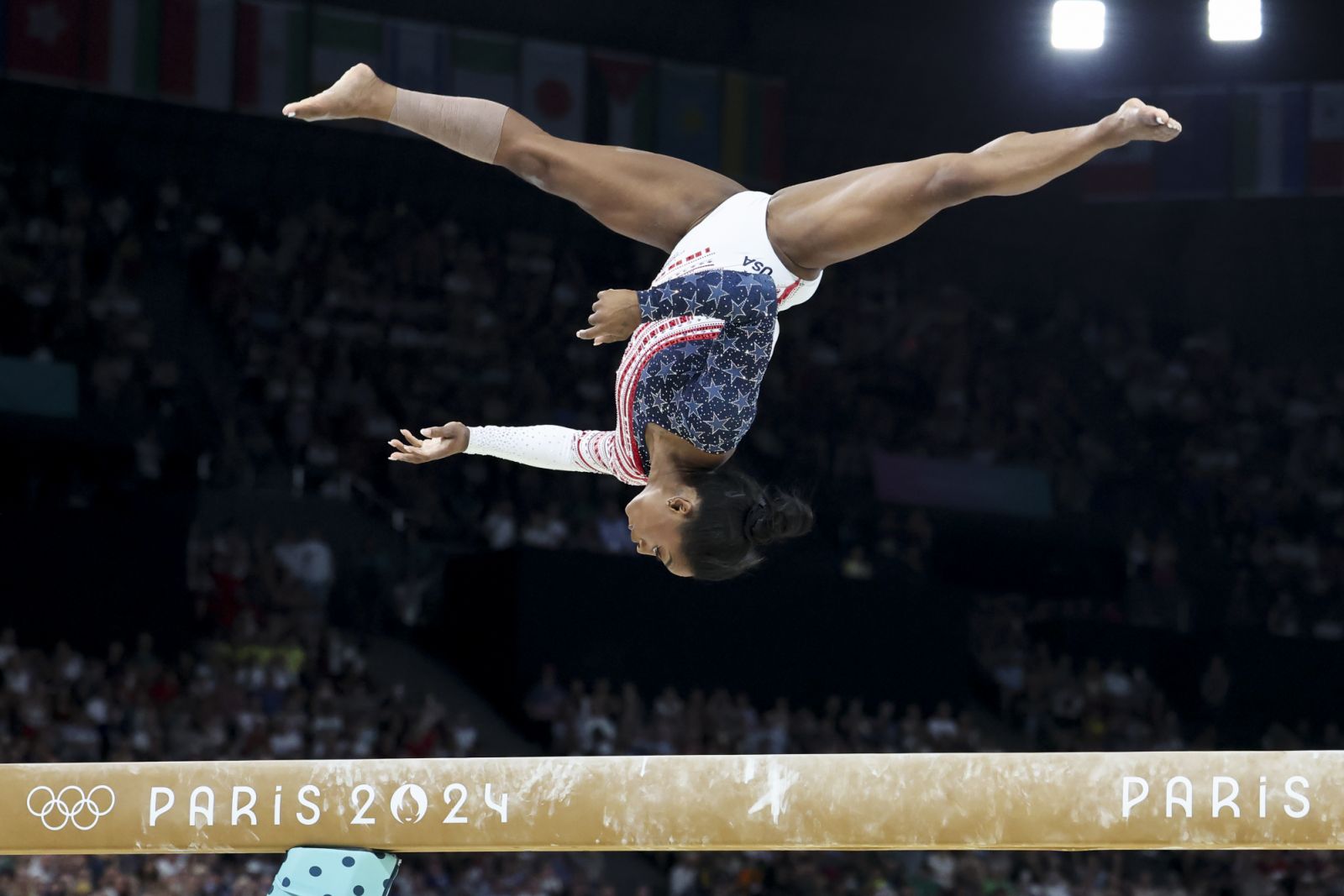 PARIS, FRANCE - JULY 30: Simone Biles of Team USA competes on the balance beam during the Artistic Gymnastics Women's Team Final on day four of the Olympic Games Paris 2024 at Bercy Arena on July 30, 2024 in Paris, France. (Photo by Catherine Steenkeste/Getty Images)