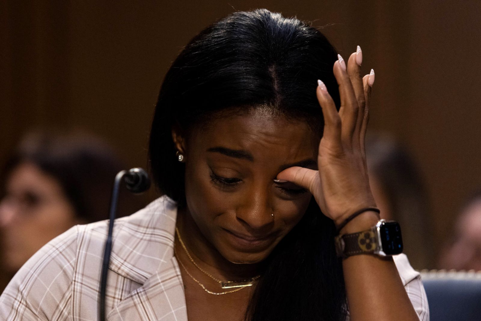 WASHINGTON, DC - SEPTEMBER 15: U.S. Olympic gymnast Simone Biles testifies during a Senate Judiciary hearing about the Inspector General's report on the FBI's handling of the Larry Nassar investigation on Capitol Hill, on September 15, 2021 in Washington, DC. Nassar was charged in 2016 with federal child pornography offenses and sexual abuse charges in Michigan. He is now serving decades in prison after hundreds of girls and women said he sexually abused them under the guise of medical treatment when he wor