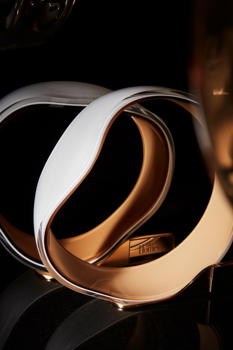 The triple colours of clear, white and gold of Barovier & Toso's Tatler Homes Design Awards 2024 - Singapore trophies were created using a secret proprietary technique