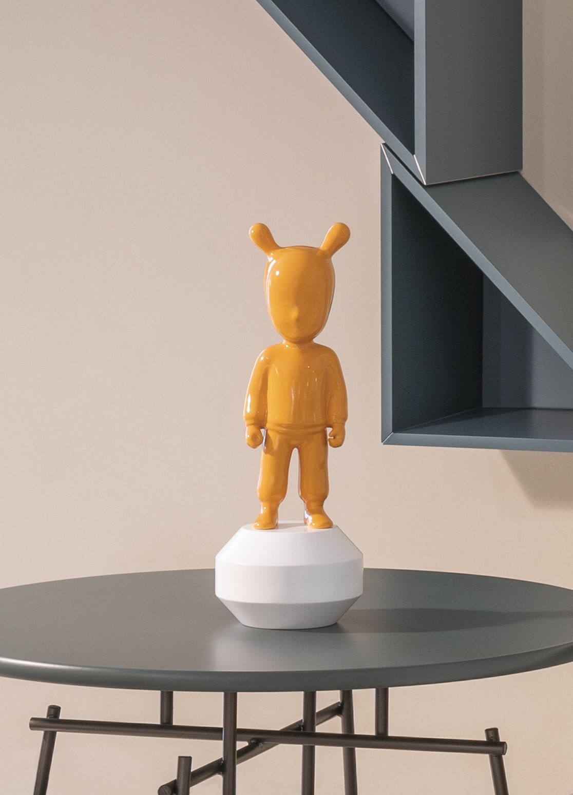 The Guest sculpture in yellow