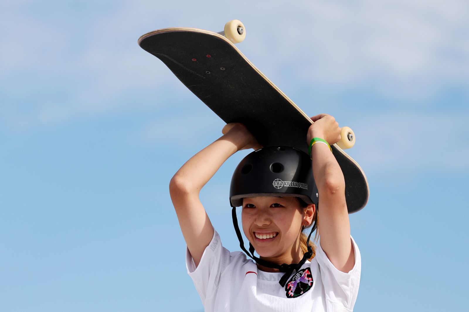 PARIS, FRANCE - JULY 28: Coco Yoshizawa of Team Japan celebrates during the Women's Street Final on day two of the Olympic Games Paris 2024 at Place de la Concorde on July 28, 2024 in Paris, France. (Photo by Julian Finney/Getty Images)