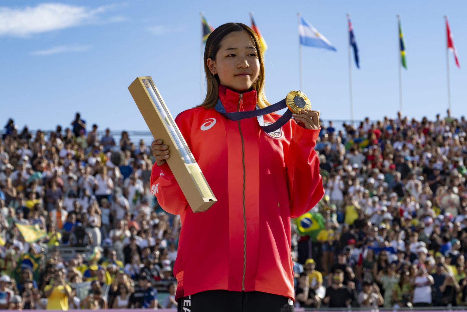 PARIS, FRANCE - JULY 28: Coco Yoshizawa of Japan poses on the podium during the Women's Street Final on day two of the Olympic Games Paris 2024 at Place de la Concorde on July 28, 2024 in Paris, France. (Photo by Richard Callis/Eurasia Sport Images/Getty Images)