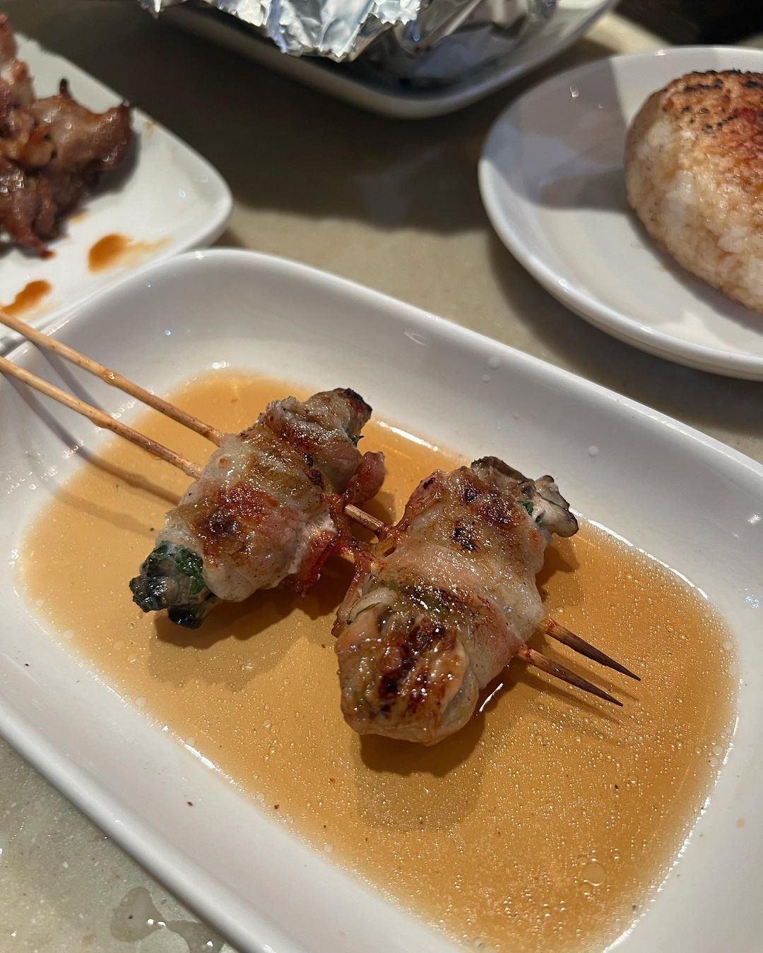 Oysters wrapped in pork slices (Photo: Instagram / @onmangequoienjuin)