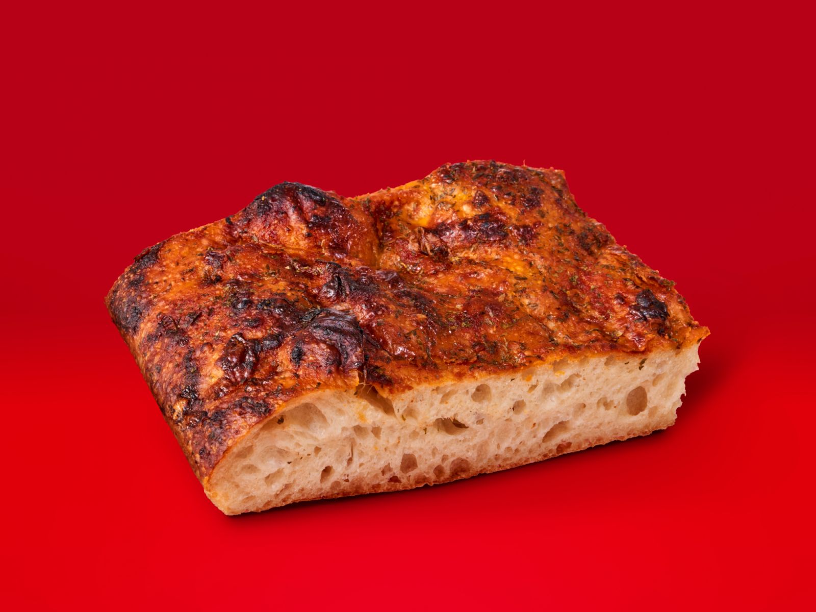 Tiong Bahru's signature focaccia bread given a Singaporean twist with a spread of chilli crab sauce (Photo: Tiong Bahru Bakery)